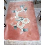 A Chinese rug with peach ground, 47" x 73"