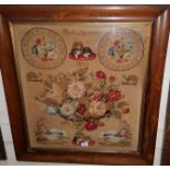 An early 19th century woolwork depicting flowers, etc., "Betty Green's Work" 1846, in rosewood