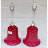 Two 19th century cranberry glass bells