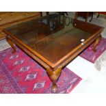 A mahogany reproduction large square top coffee table