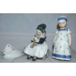 Three items of Royal Copenhagen ware: seated Amish girl, no 134; "Else" limited edition; a duck