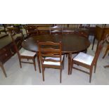 A Stag Minstrel mahogany dining suite comprising oval table, 6 ladder back chairs, sideboard and 6