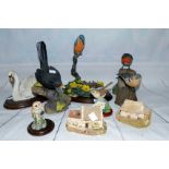 A Country Arts resin kingfisher figure; a selection of similar birds