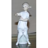 A leather suitcase; small and decorative items; a Lladro figure of a girl