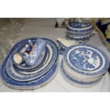 A selection of "Real Old Willow" meat plates; other willow pattern plates and tureens