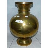 A large Indian brass spherical vase with engraved decoration of genre scene, 15"