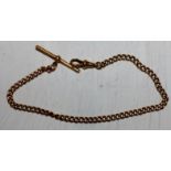 An 18 carat gold chain with bar and clip, 23.3 gm