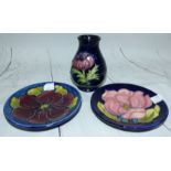 A small Moorcroft vase, 3¾" (rim repaired); a pair of pin dishes