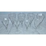 Four Waterford Crystal slice cut wines; 4 similar smaller wines