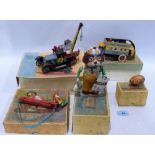 Five boxed tinplate toys