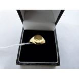 A gentleman's signet ring. In gold marked 18c. 5.4g