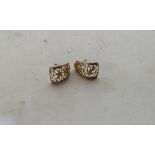 A pair of 9ct foliate pierced earrings