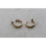 A pair of silver hoop earrings