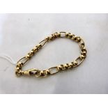 A 9ct roller link bracelet. 17.4g