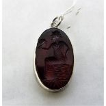 An agate and silver intaglio pendant with matrix of a classical figure.1¼' high