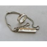 Tiffany & Co: A silver ingot pendant necklace and ring. Both stamped T & Co. Tiffany box