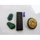 A Chinese carved bone brooch, a Chinese ink stone and three items of carved hardstone