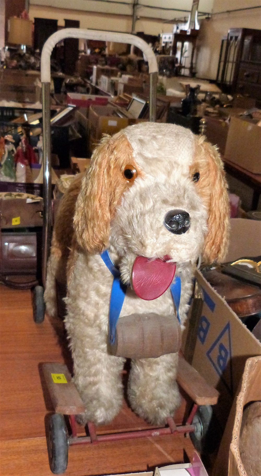 A vintage Tri-ang push-along toy dog