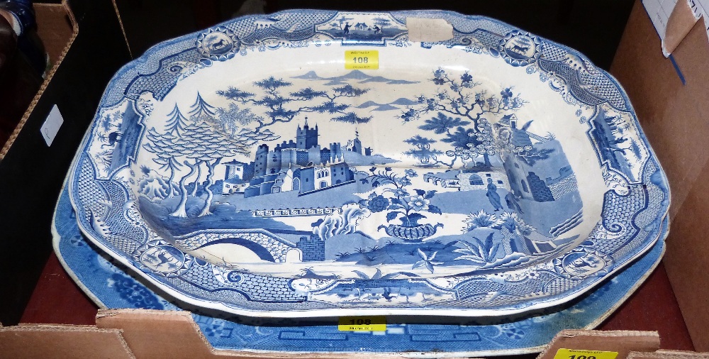 A 19th century Willow pattern meat plate and a blue and white meat plate with juice well (damage