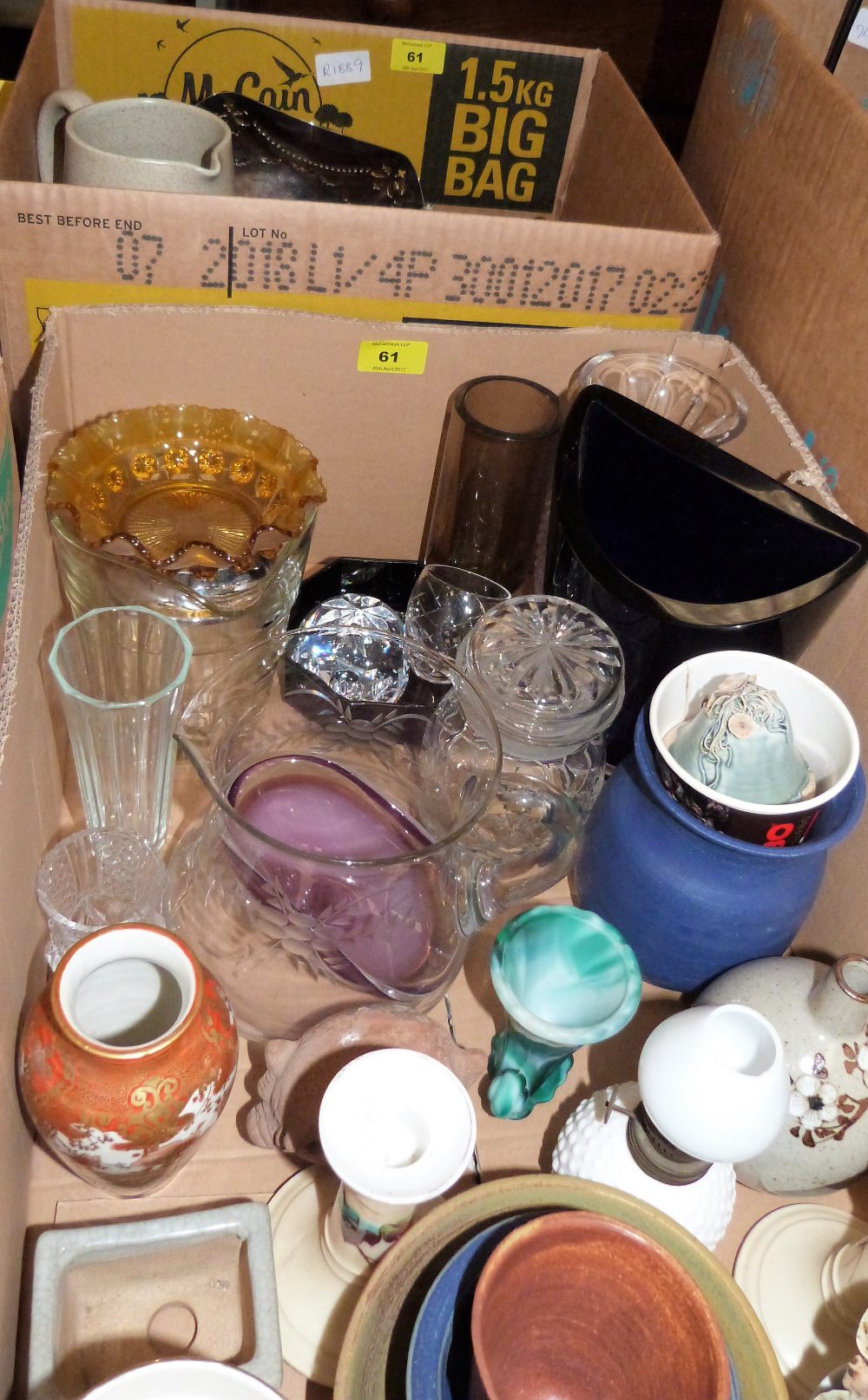 A box of metalware and a box of glassware and ceramics