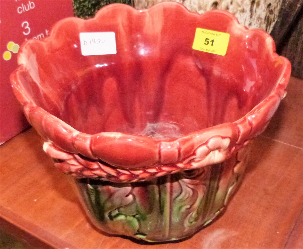 A Victorian Ault jardinière moulded with acanthus in shades of red and green. 7'' high