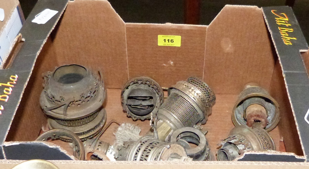 A box of oil lamp burners