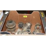 A box of oil lamp burners