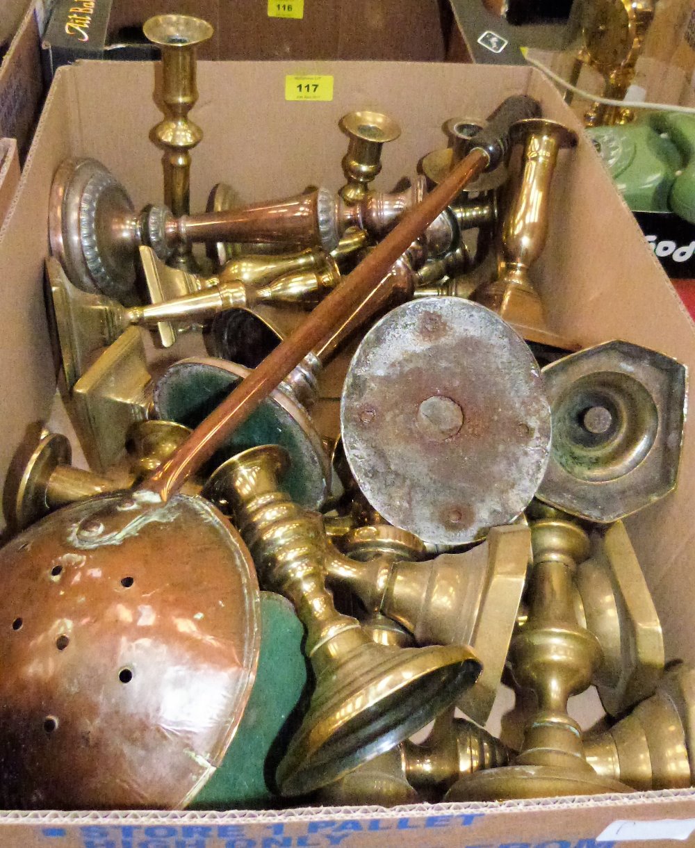 A collection of 19th century brass candlesticks and other metalware