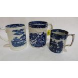 A Liverpool blue and white decorated mug c.1790, 6'' high and two other blue and white mugs, early