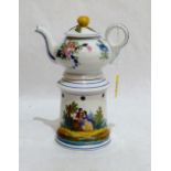 A 19th century French veilleuse teapot on burner stand, painted in colours with lovers in a garden