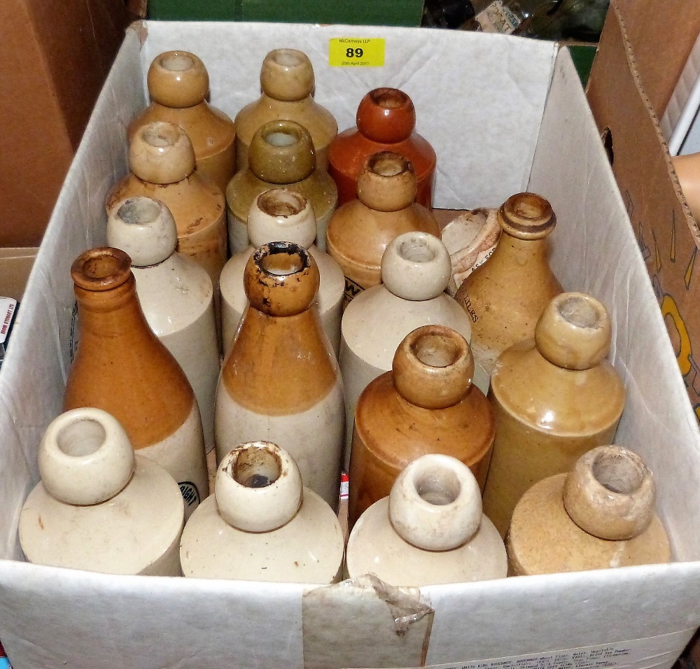 A collection of old ginger beer stoneware bottles