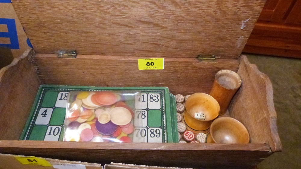An oak box with vintage games