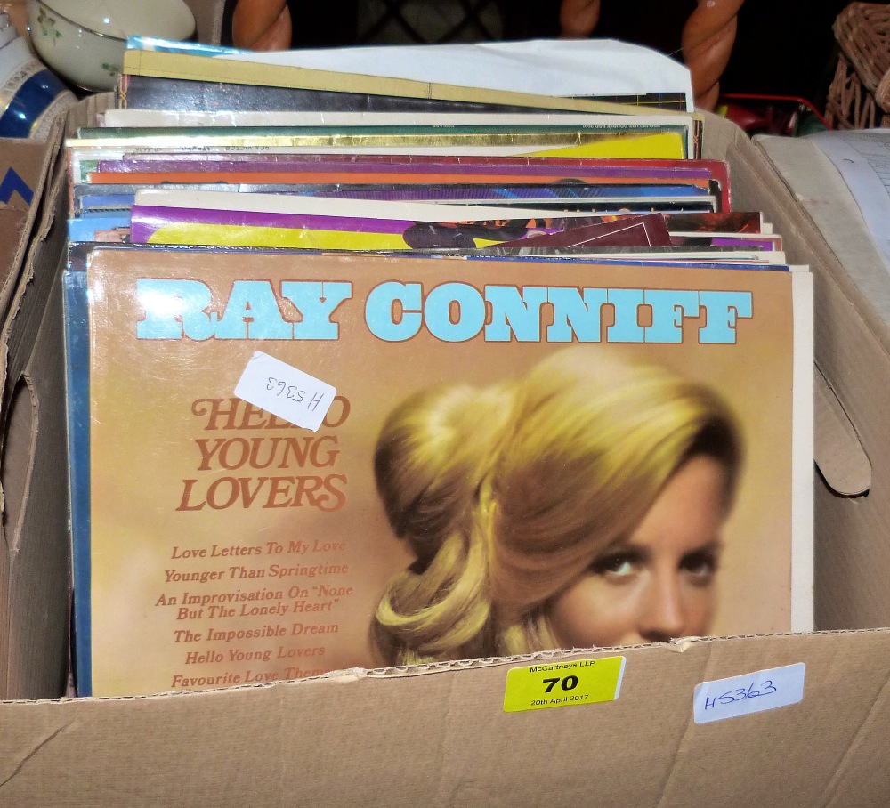 A box of long playing vinyl records