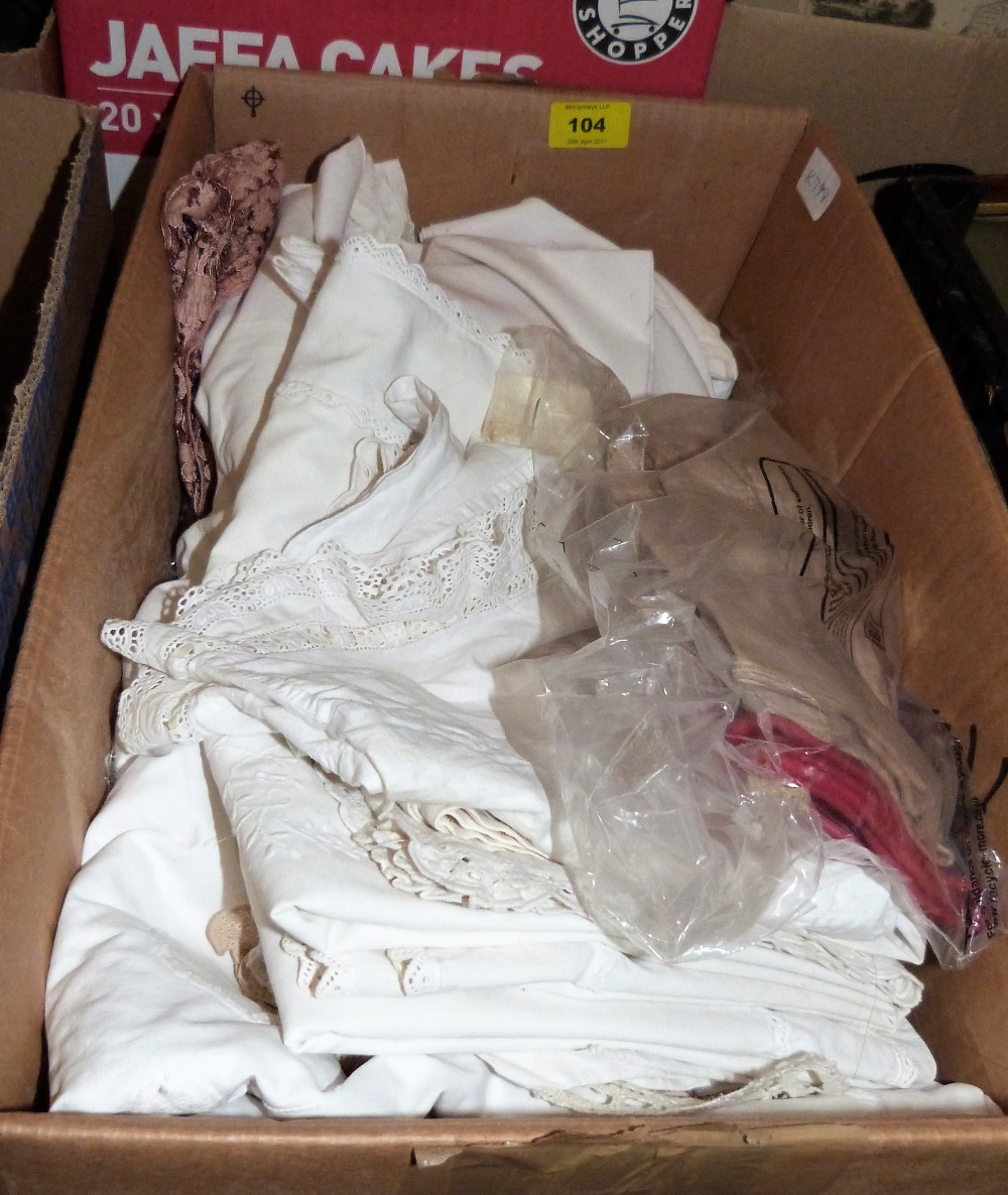 A box of linen and lace textiles with lady's kid gloves