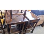 An oak drop-leaf tea trolley and a gate leg table