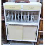 A 1950's 'retro' kitchen cabinet, enclosed by a pair of sliding glass doors over a sliding work