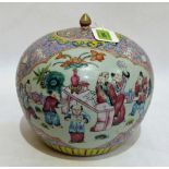 A Chinese famille-rose jar and cover decorated with meandering foliage and figure scenes in two