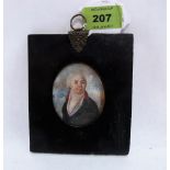 A George IV portrait miniature of a gentleman. Ebonised frame with suspension loop