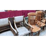 A pair of elbow chairs and a pair of lath back kitchen chairs