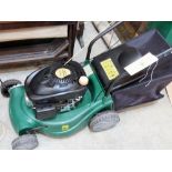 A petrol motor mower