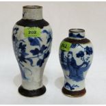 Two Chinese blue and white crackle glazed inverted baluster vases, the larger 9'' high