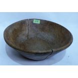 A sycamore dairy bowl with moulded rim. 12½' diameter. Splits