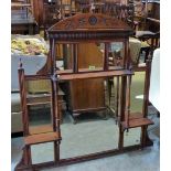 An Edward VII mahogany over mantle with sectional mirror plates and display shelves. 46'' wide