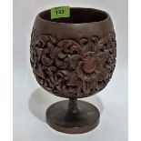 A treen goblet, carved in high relief with foliage. 8'' high