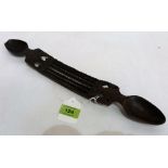 A 19th century Welsh carved treen marriage spoon. 16'' long