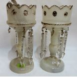 A pair of Victorian frosted glass table lustres hung with prismatic drops. 13½'' high