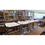 A set of six oak Lancashire style ladder-back chairs with rush seats. Of recent manufacture