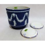 A Wedgwood jasperware jardinière, chipped, and a pair of Paragon teapot stands with crest for the