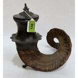 A 19th century horn and pewter mounted table snuffbox, the lid with horse finial. 10¼'' high