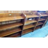 A set of three open bookcases, each with four shelves and 27'' wide